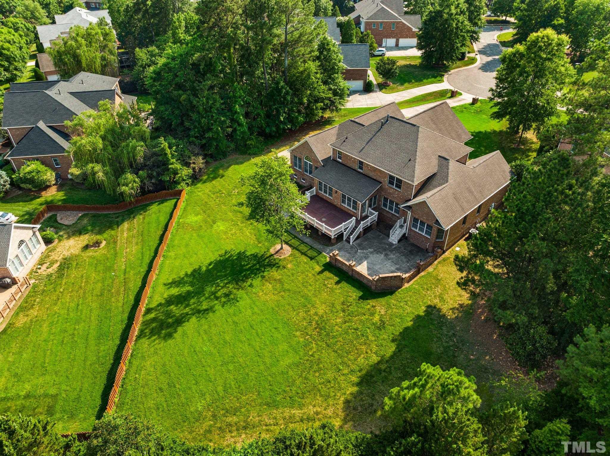 9501 Bluemont Court Raleigh, NC 27617 - Photo 20 of 85 an aerial view of a house with pool