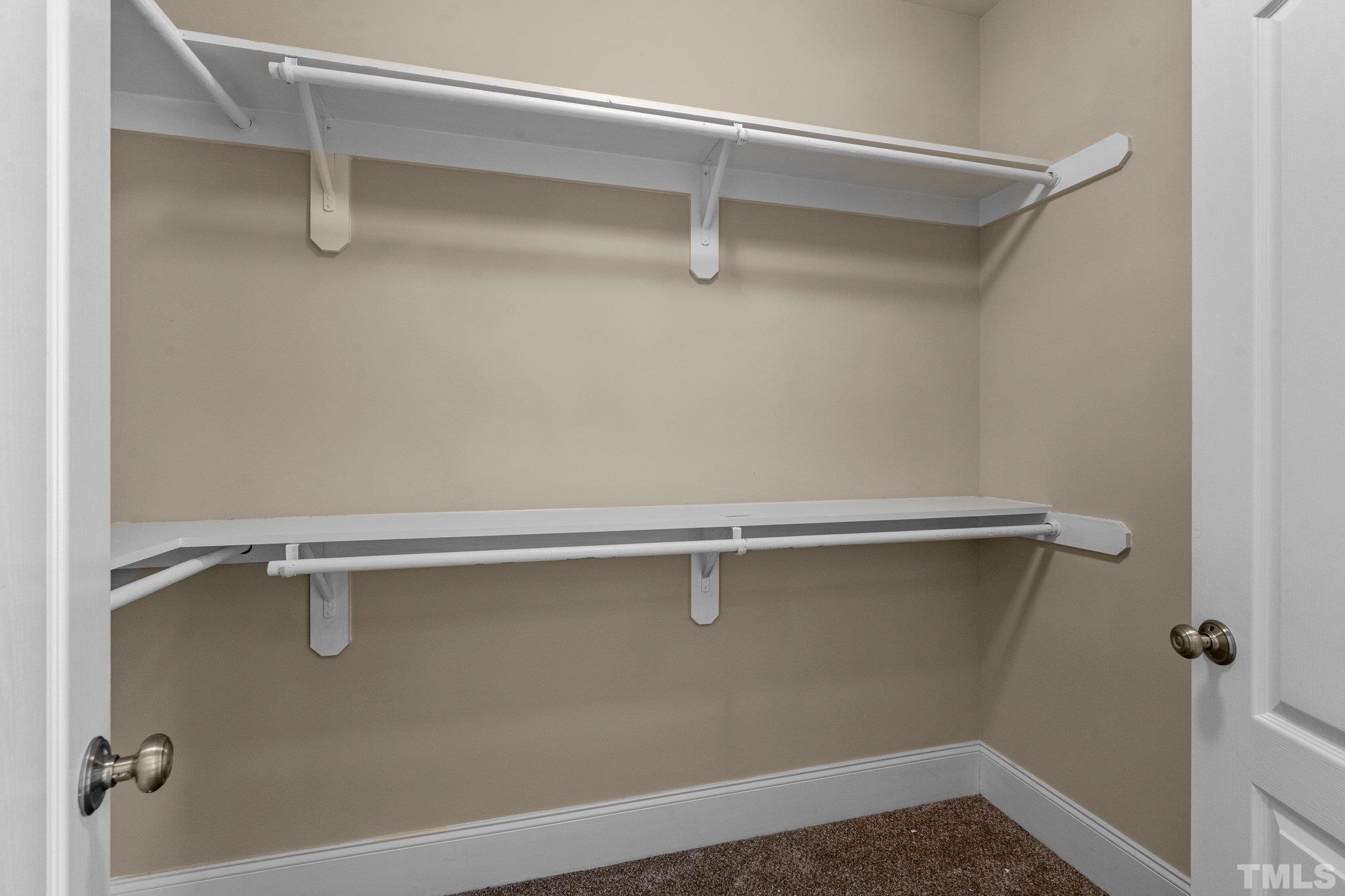 9501 Bluemont Court Raleigh, NC 27617 - Photo 40 of 85 a close up view of racks on the wall