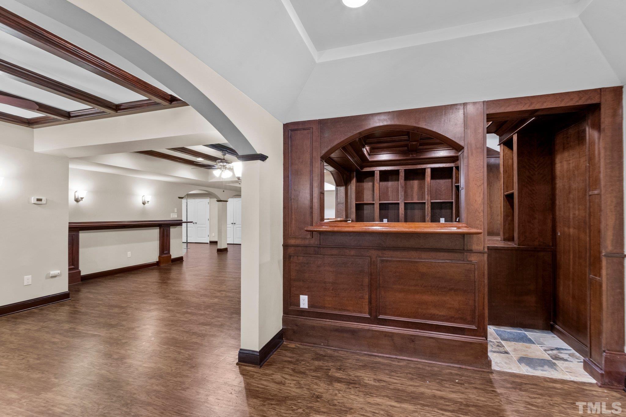 9501 Bluemont Court Raleigh, NC 27617 - Photo 65 of 85 a view of empty room with wooden floor and windows