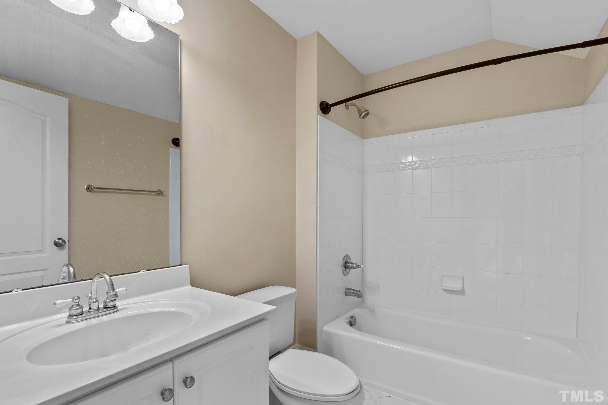 9501 Bluemont Court Raleigh, NC 27617 - Photo 72 of 85 a bathroom with a sink toilet and shower