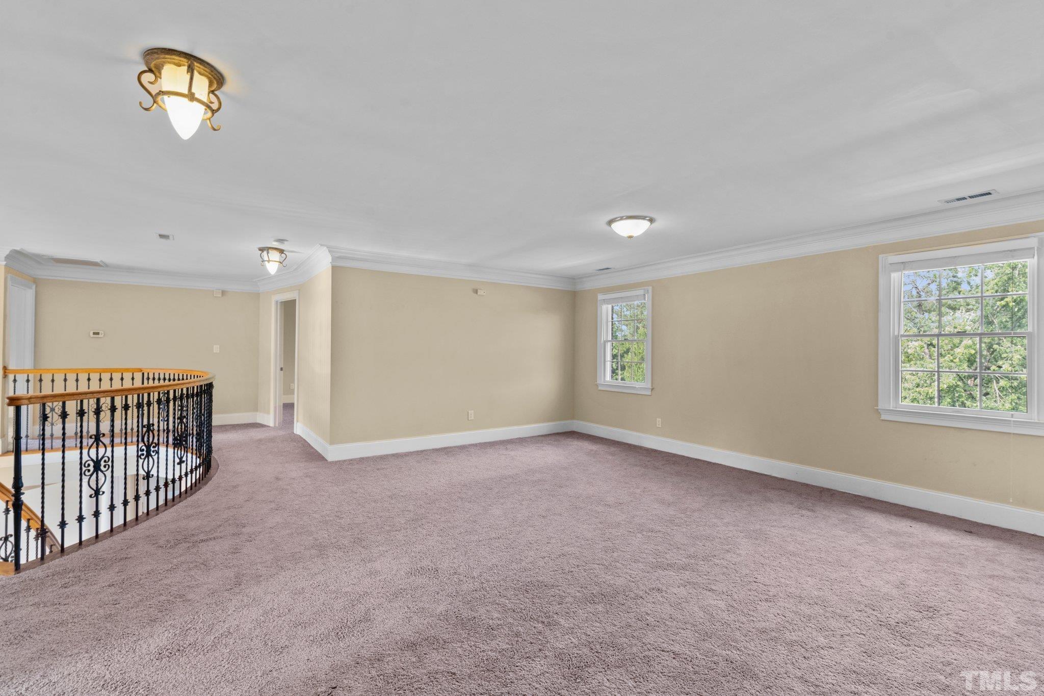 9501 Bluemont Court Raleigh, NC 27617 - Photo 79 of 85 a view of an empty room with a window