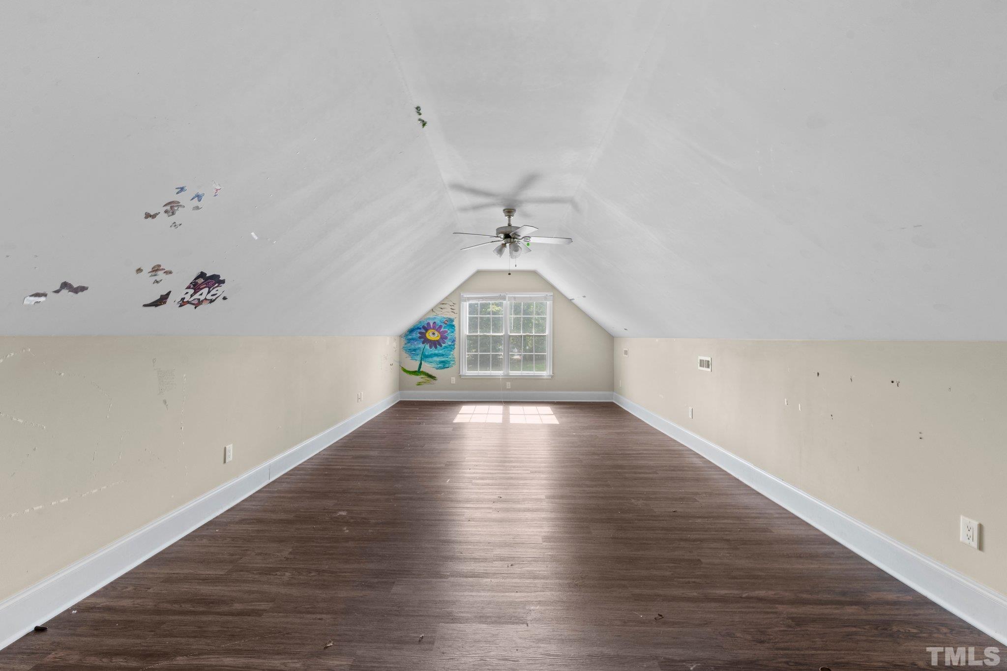 9501 Bluemont Court Raleigh, NC 27617 - Photo 80 of 85 a view of empty room with wooden floor