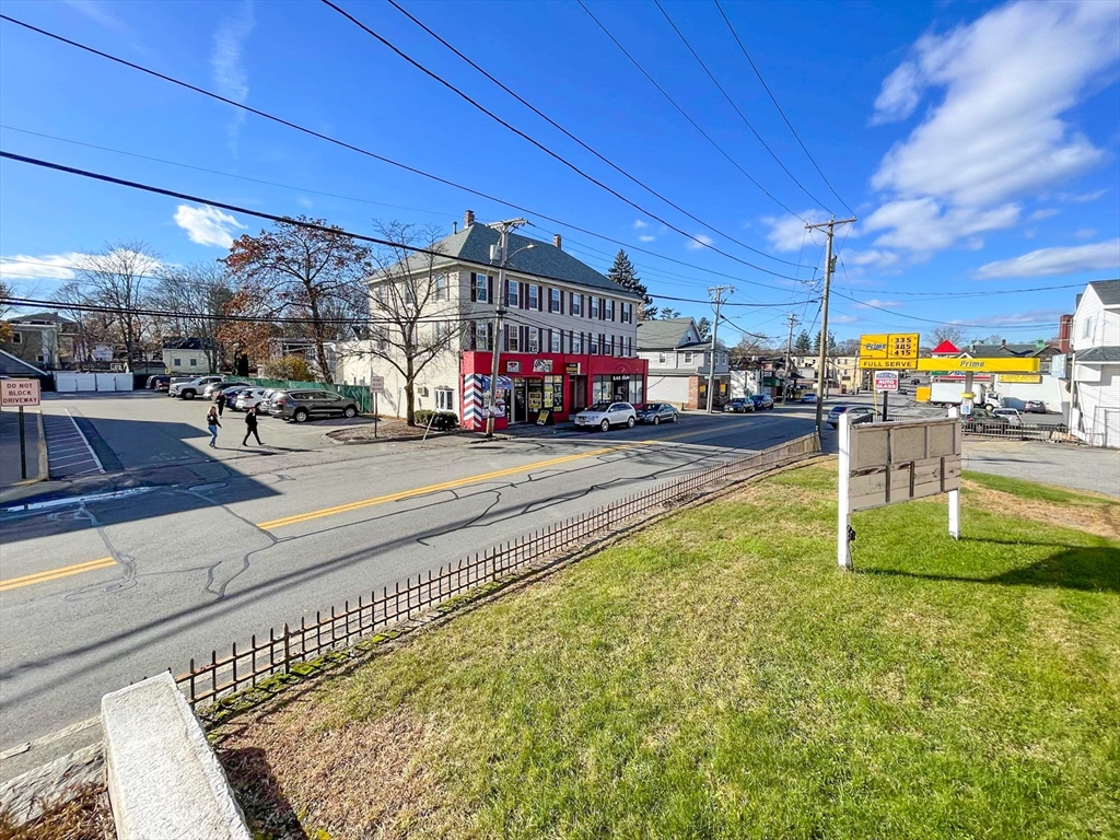 42 Mammoth Road Lowell, MA 01854 - Photo 3 of 15 a view of a gym with a slide