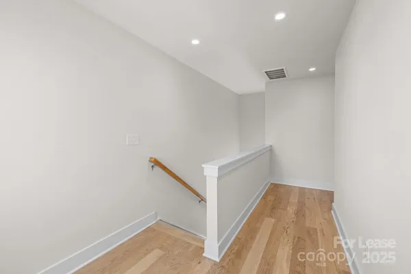 a view of hallway with stairs