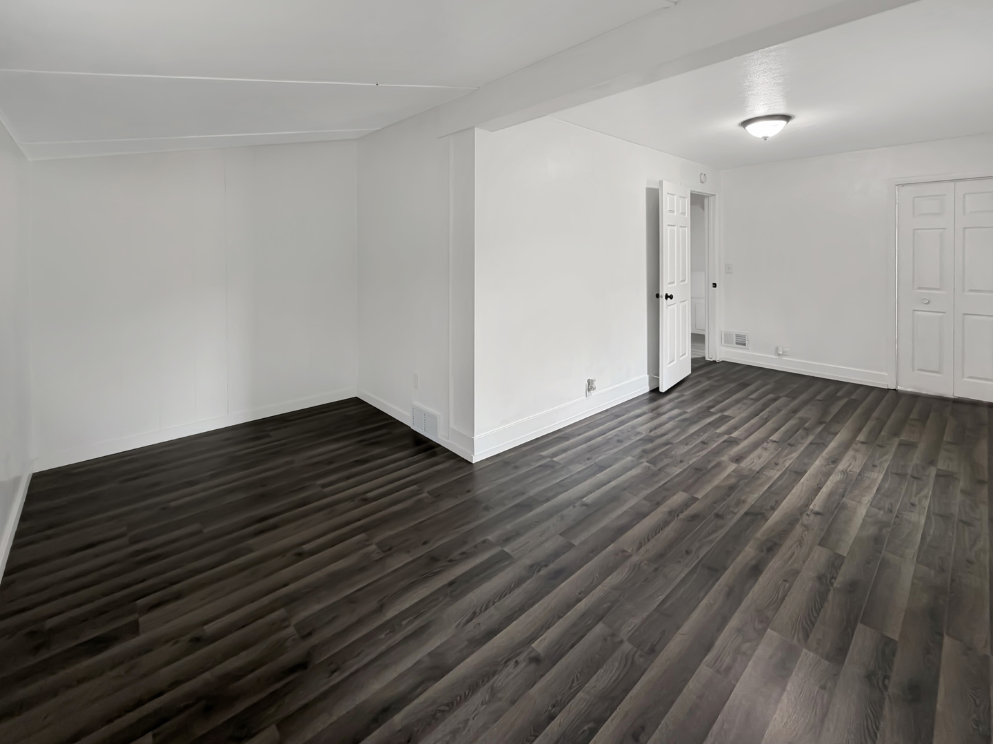 1534 West Fairview Road Freeport, IL 61032 - Photo 14 of 30 a view of an empty room with wooden floor