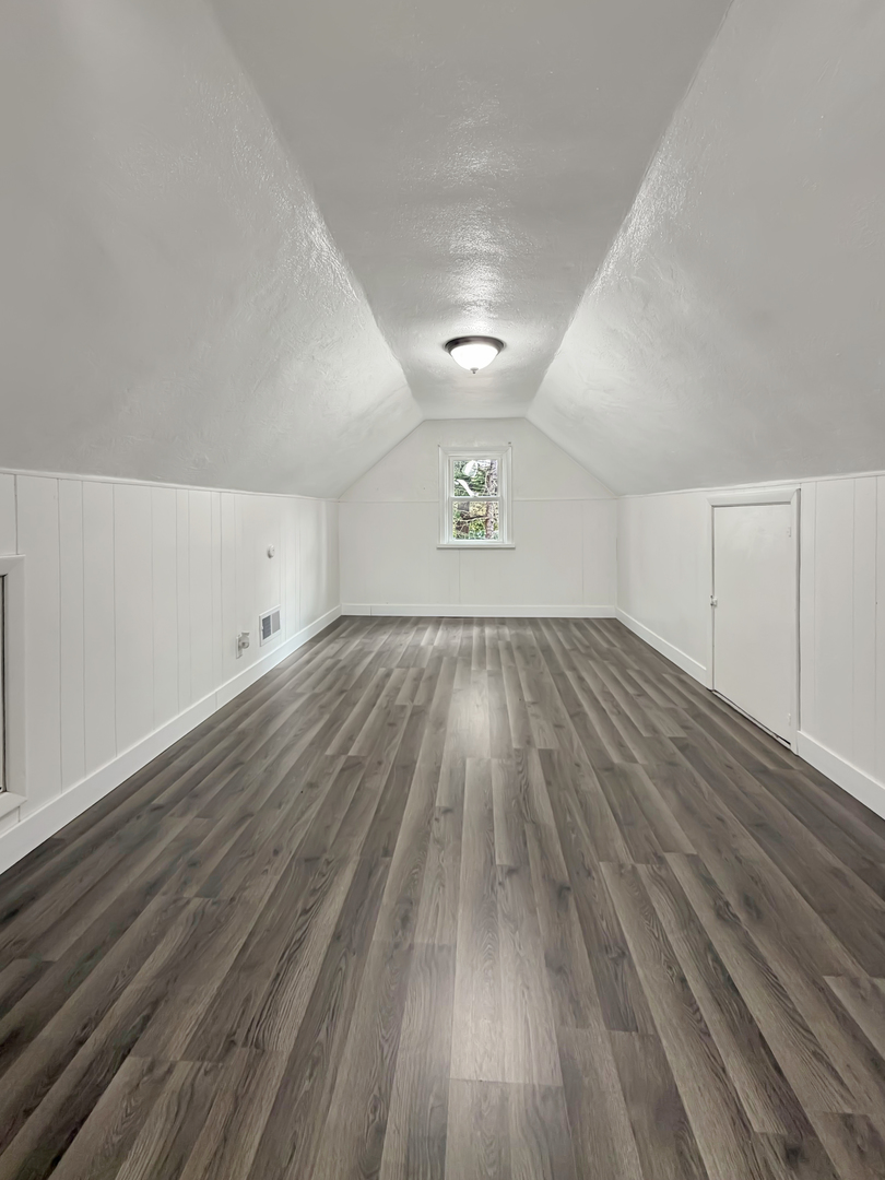 1534 West Fairview Road Freeport, IL 61032 - Photo 18 of 30 wooden floor in an empty room with a window