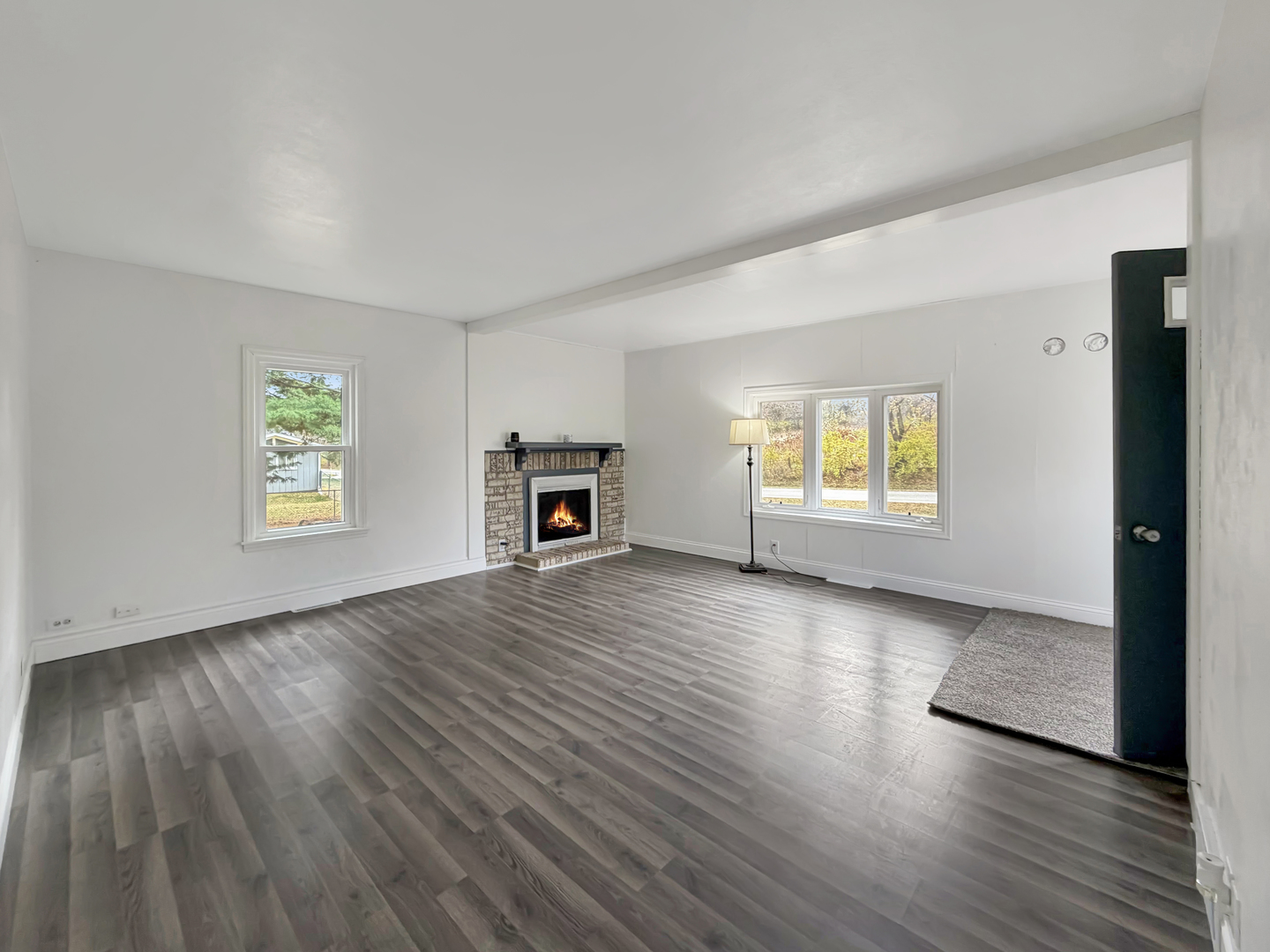 1534 West Fairview Road Freeport, IL 61032 - Photo 4 of 30 wooden floor in an empty room with a window