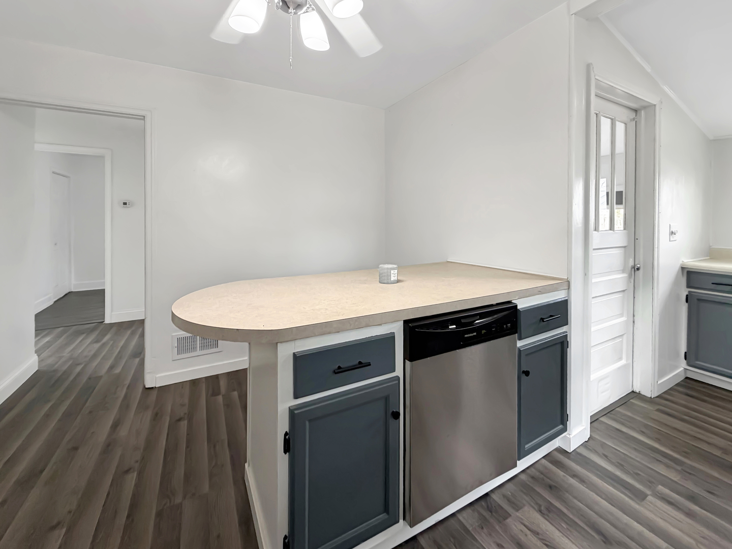 1534 West Fairview Road Freeport, IL 61032 - Photo 7 of 30 a kitchen with a sink and wooden floor