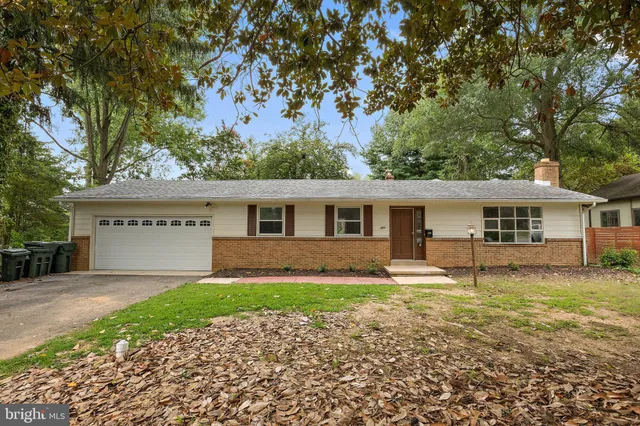front view of a house with a big yard
