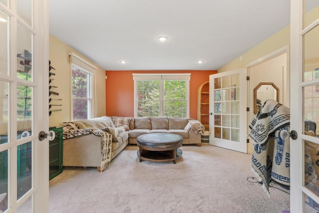 94 Turner Road Townsend, MA 01469 - Photo 15 of 42 a living room with furniture and a large window