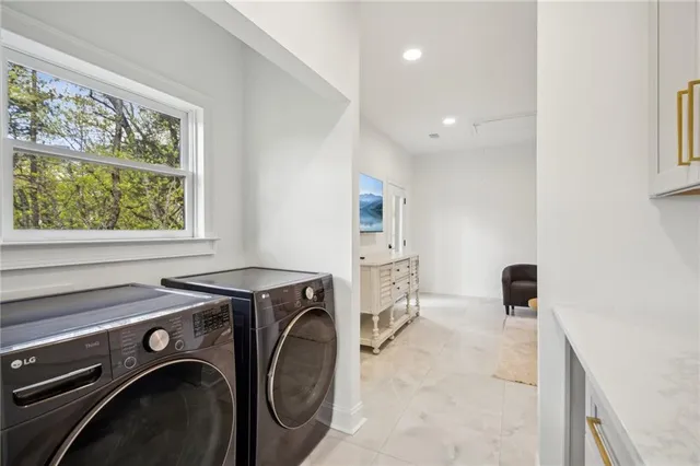 a view of a balcony with wooden floor and fence