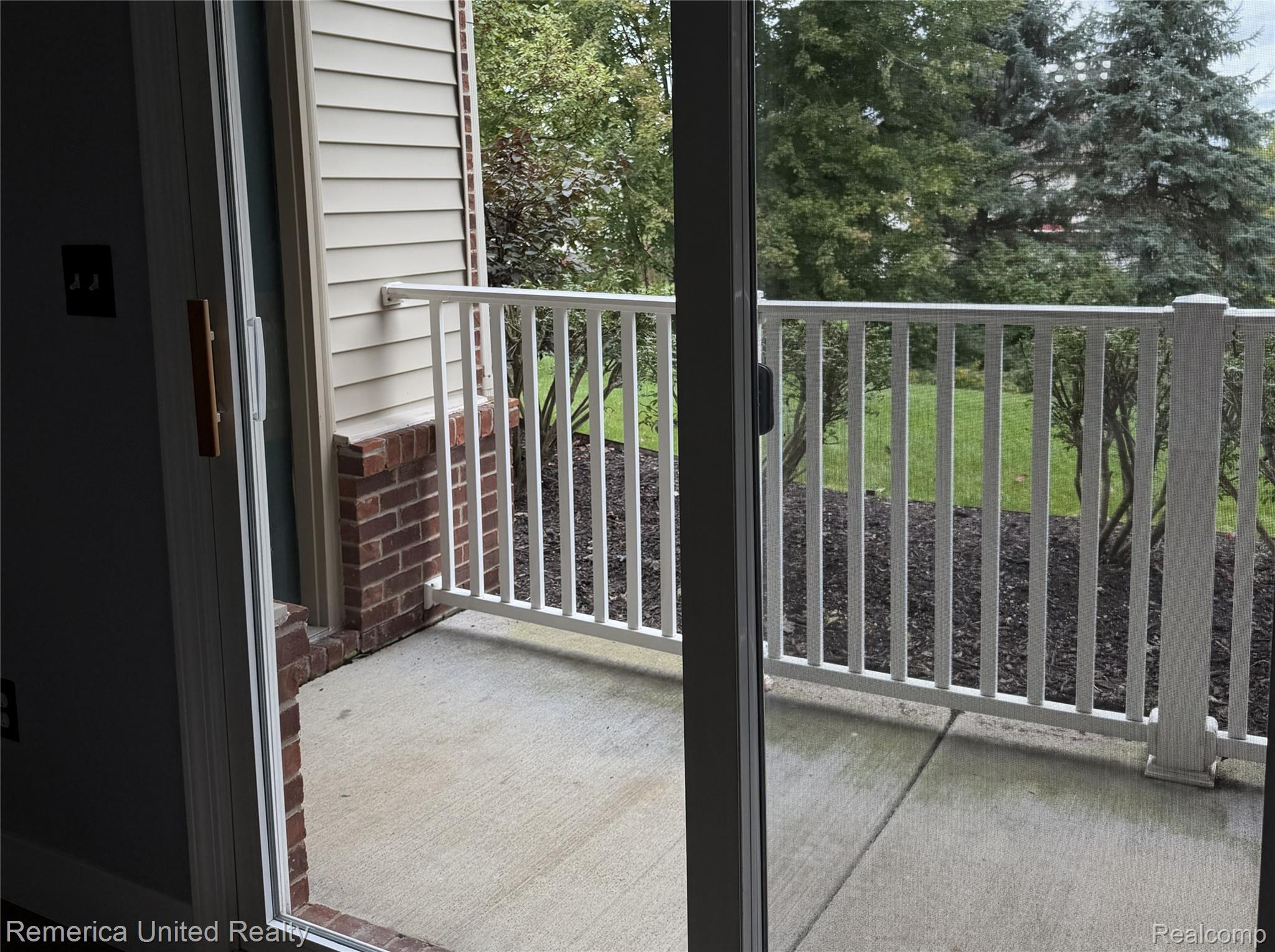 4129 Hampton Ridge Boulevard Howell, MI 48843 - Photo 28 of 30 Patio is accessible from the primary bedroom or the door off the living room