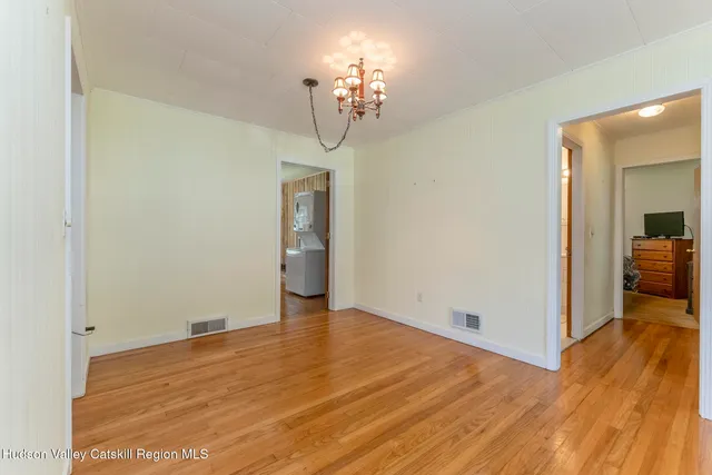 a view of a livingroom with wooden floor
