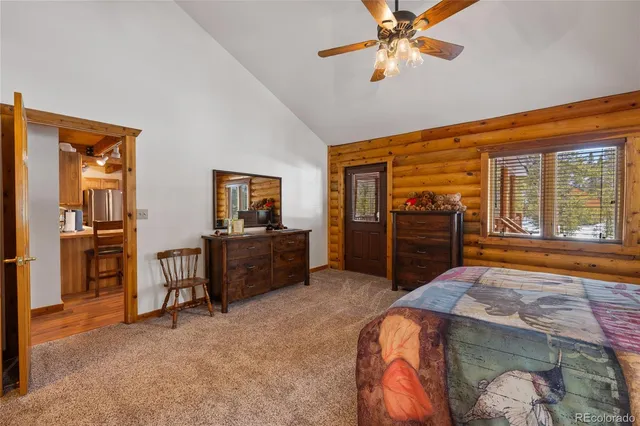 a bedroom with furniture and window