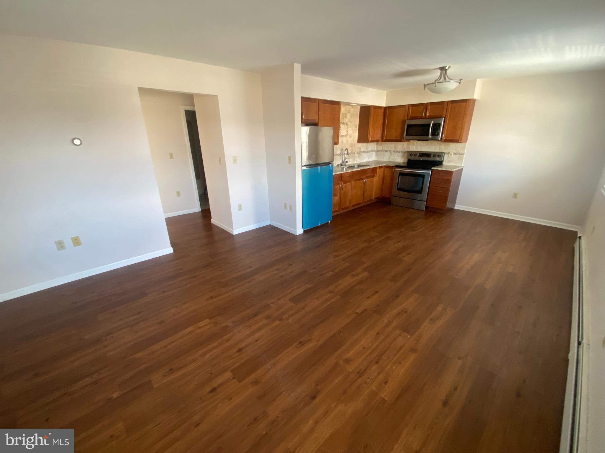 427 Smith Street, Unit 2R Dunmore, PA 18512 - Photo 1 of 7 a kitchen with a sink and a stove top oven