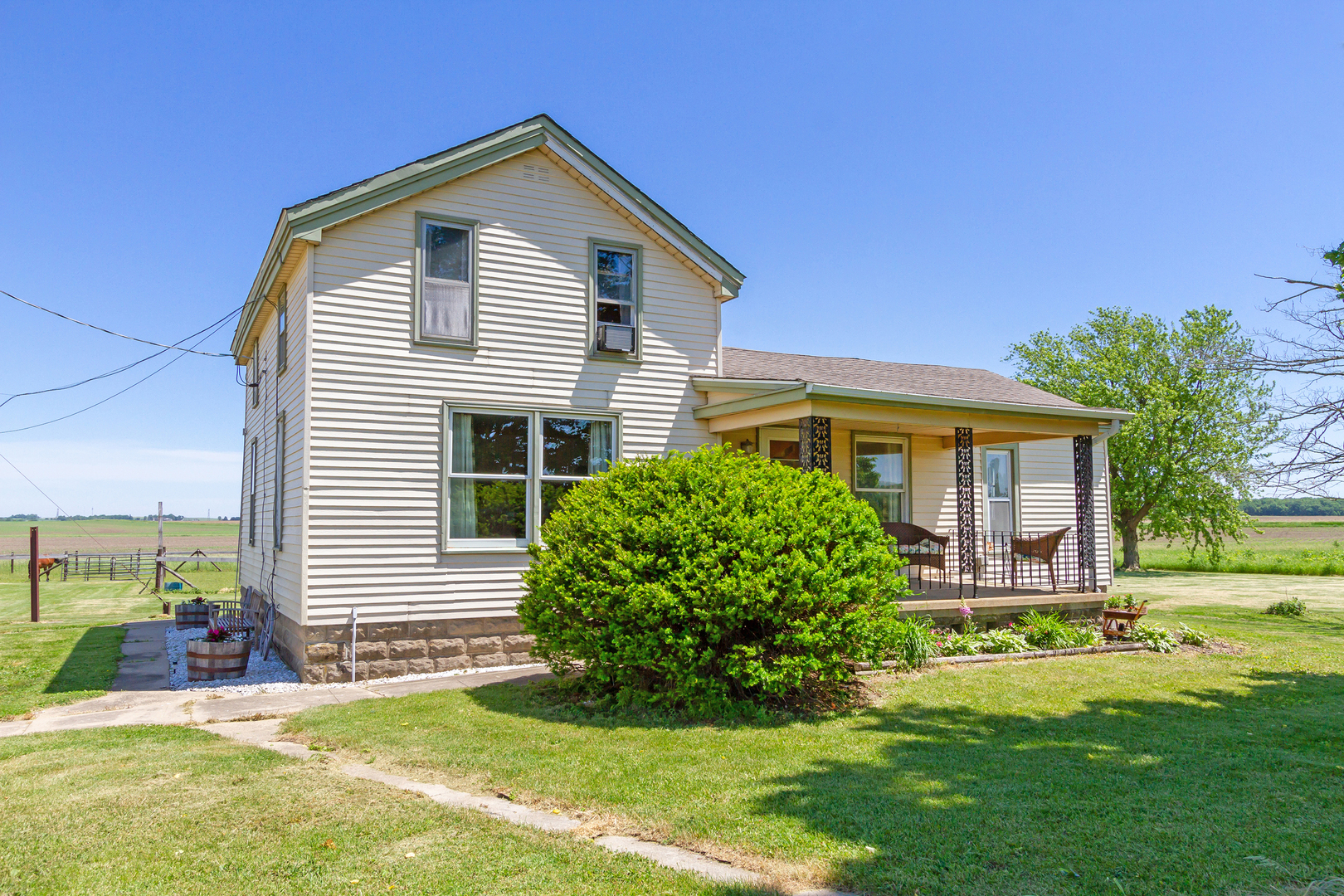 4783 Cherry Valley Road Kirkland, IL 60146 - Photo 1 of 41 a front view of a house with a yard