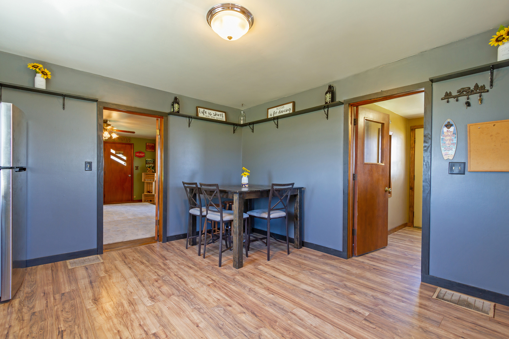 4783 Cherry Valley Road Kirkland, IL 60146 - Photo 12 of 41 a view of a dining room with furniture window and wooden floor