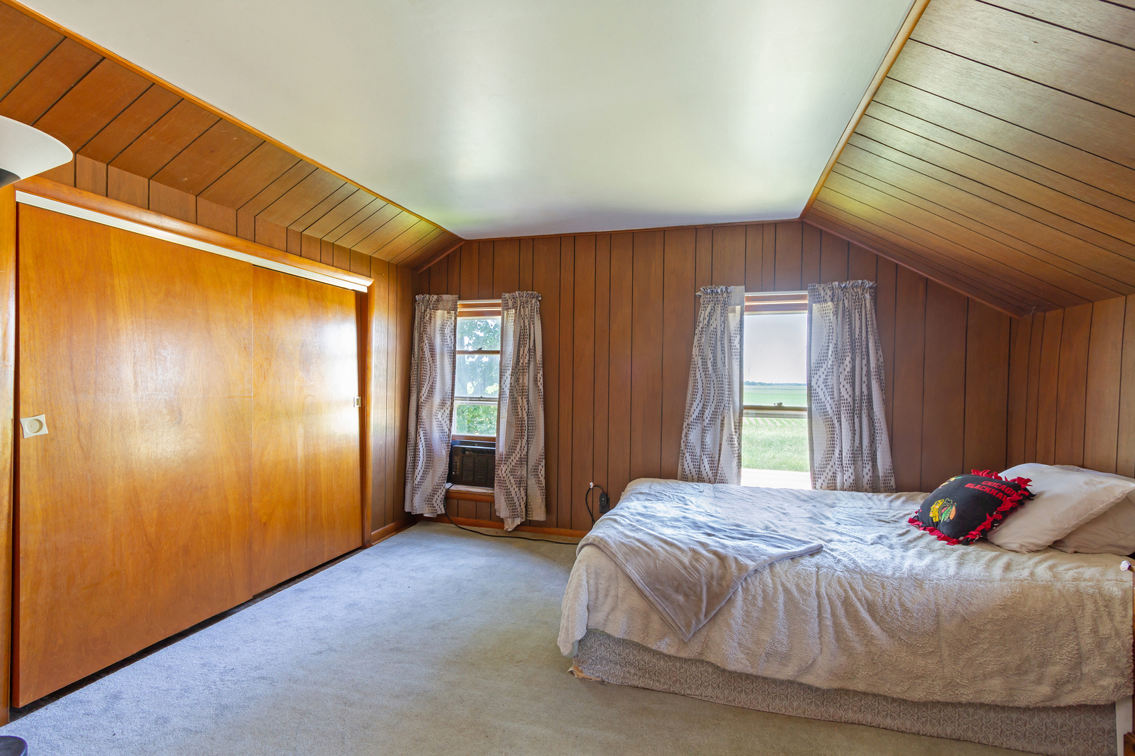 4783 Cherry Valley Road Kirkland, IL 60146 - Photo 18 of 41 a bedroom with a bed and a window