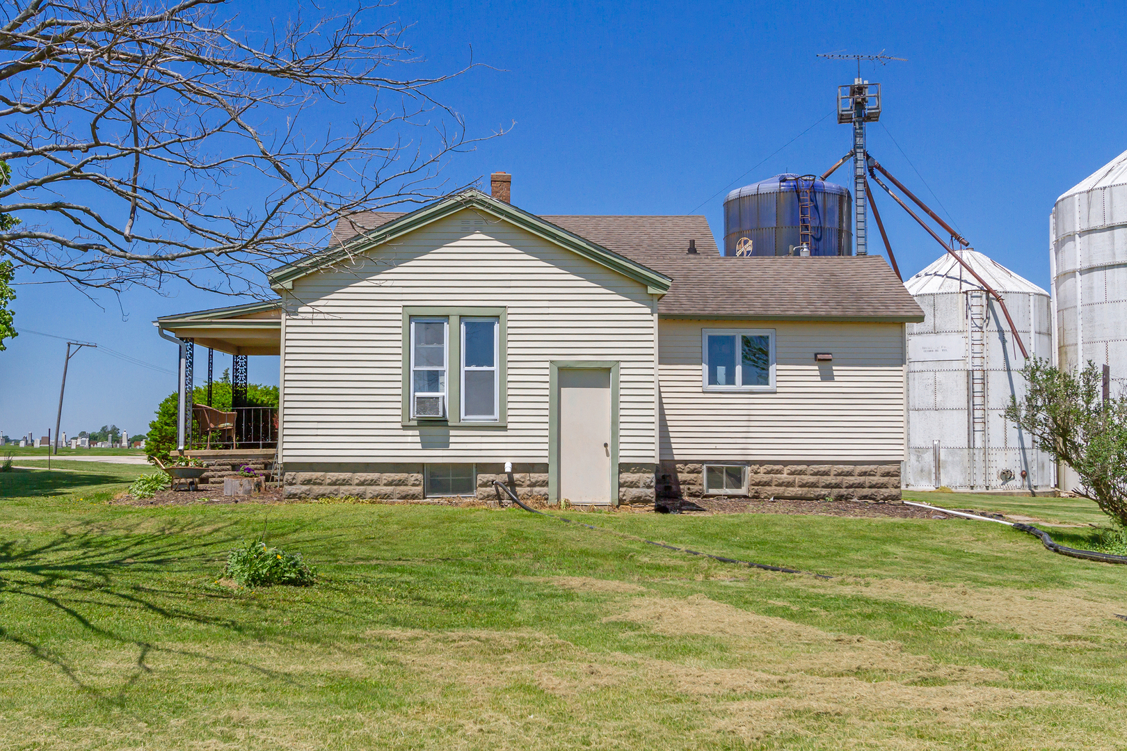 4783 Cherry Valley Road Kirkland, IL 60146 - Photo 22 of 41 a front view of a house with a yard