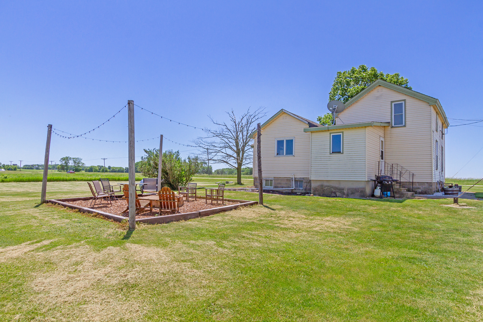 4783 Cherry Valley Road Kirkland, IL 60146 - Photo 4 of 41 a view of a house with backyard and porch