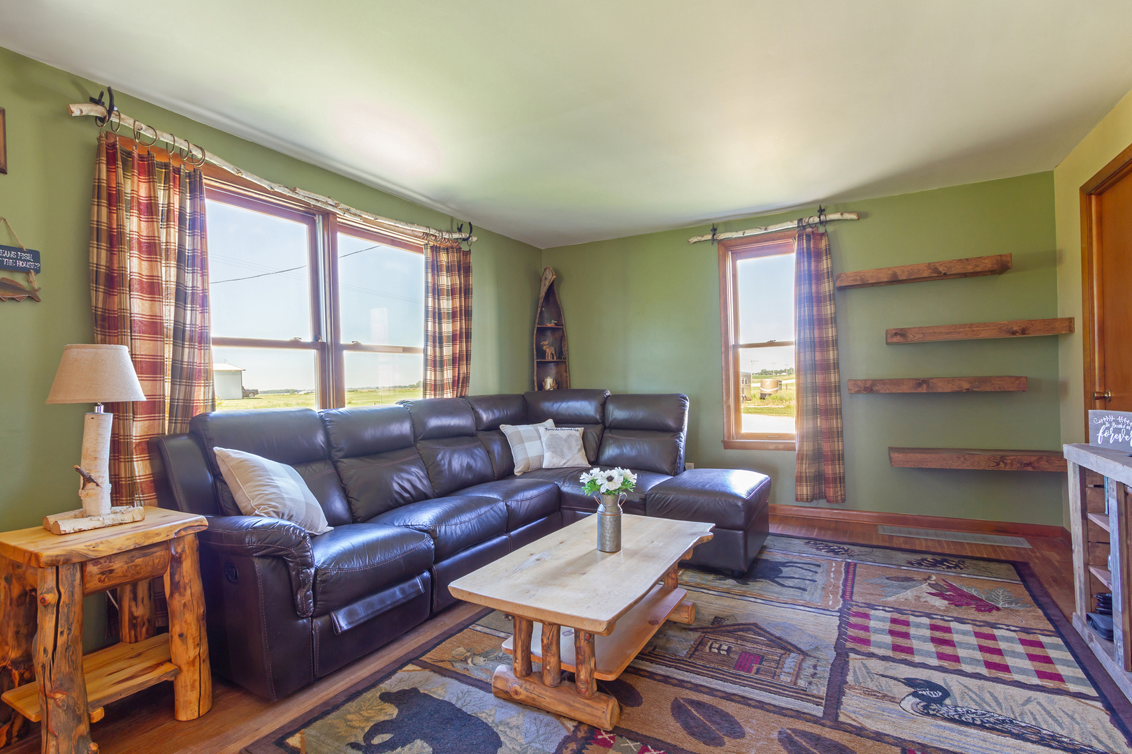 4783 Cherry Valley Road Kirkland, IL 60146 - Photo 8 of 41 a living room with furniture and a window