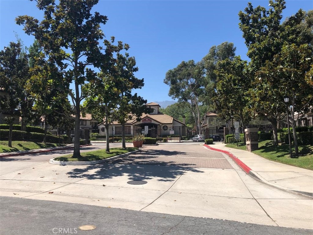 12584 Atwood Court, Unit 1824 Rancho Cucamonga, CA 91739 - Photo 13 of 15 a street view with large trees