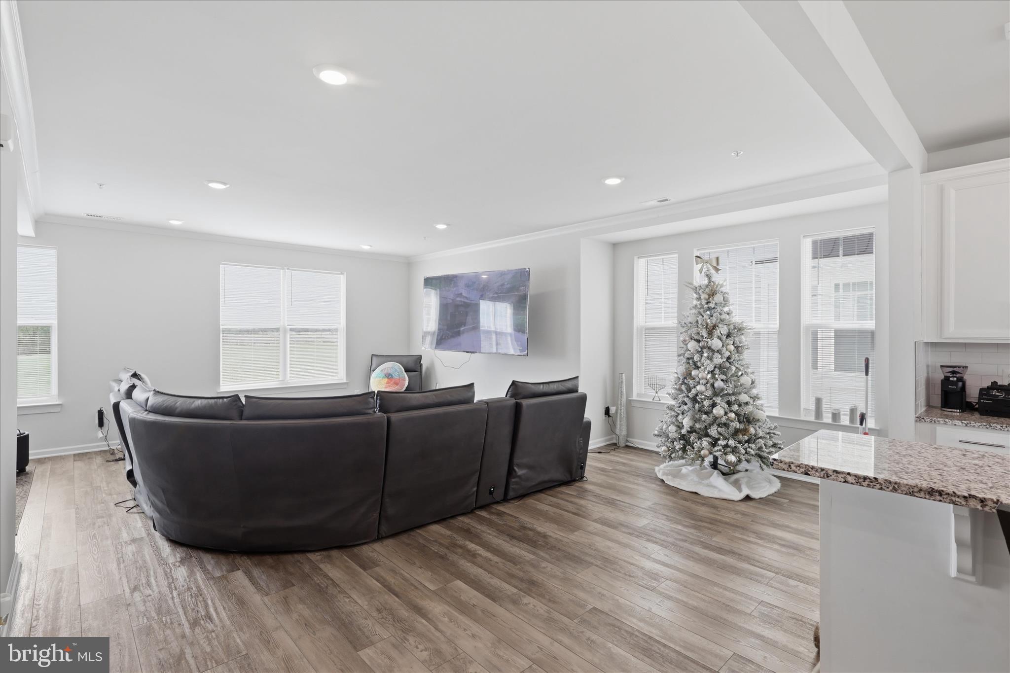 4932 MacDonough Place Frederick, MD 21703 - Photo 11 of 70 a living room with furniture and a large window