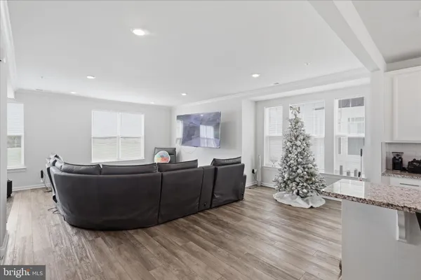 a view of walk in closet with clothes