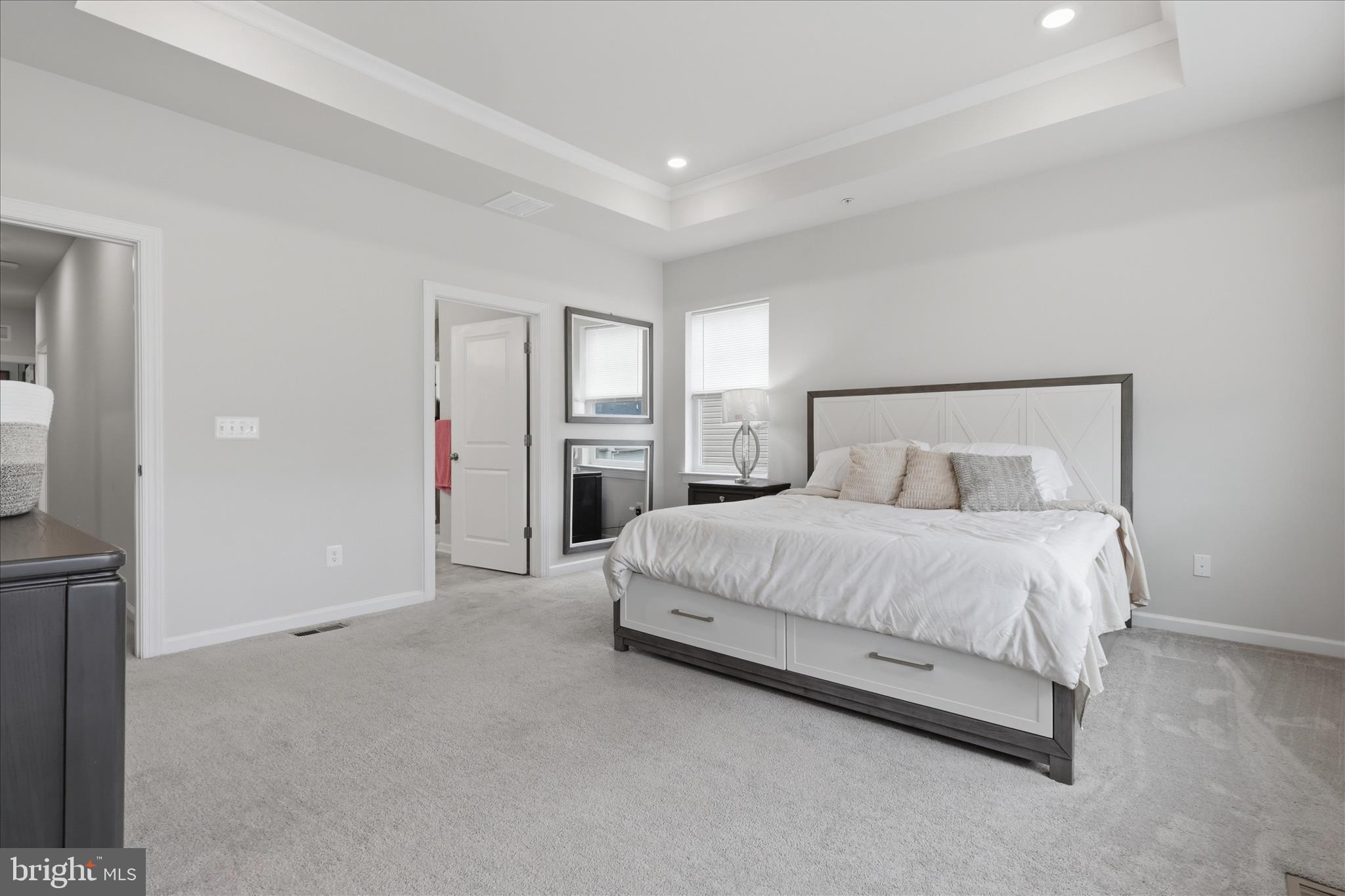 4932 MacDonough Place Frederick, MD 21703 - Photo 38 of 70 a spacious bedroom with a bed and closet