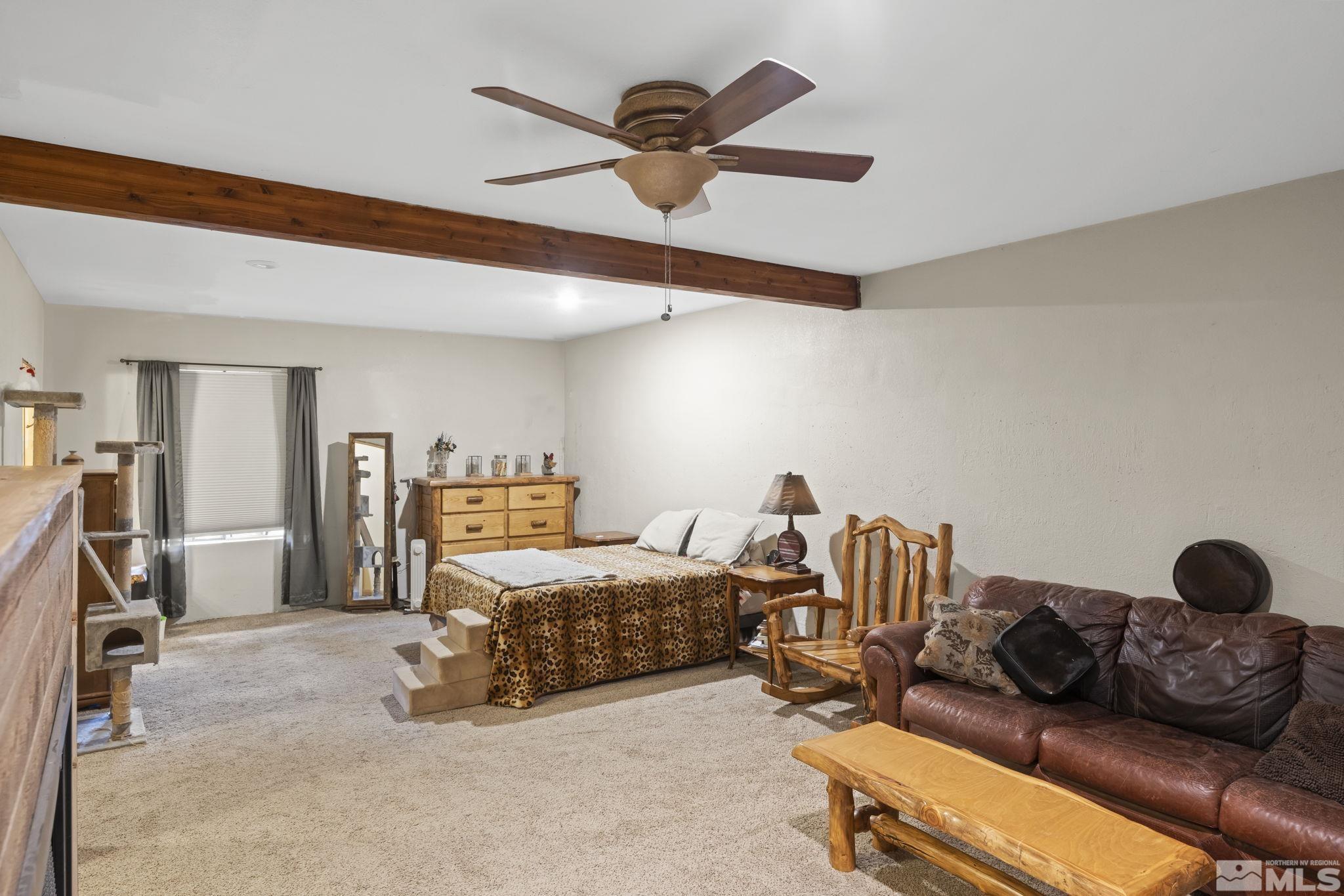 2200 Lousetown Road Reno, NV 89521 - Photo 19 of 40 a bedroom with bed and window