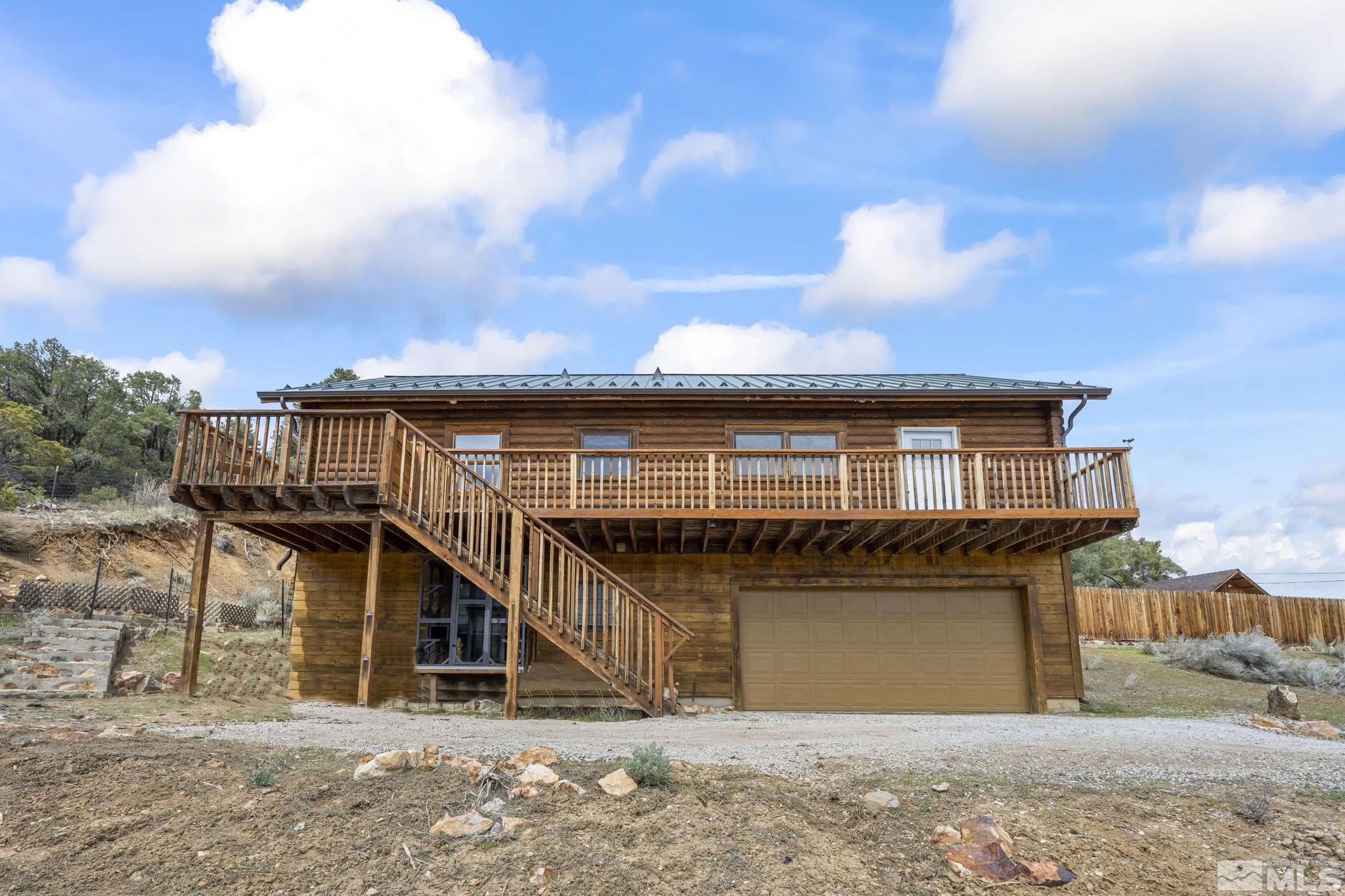 2200 Lousetown Road Reno, NV 89521 - Photo 3 of 40 a front view of a house with a balcony