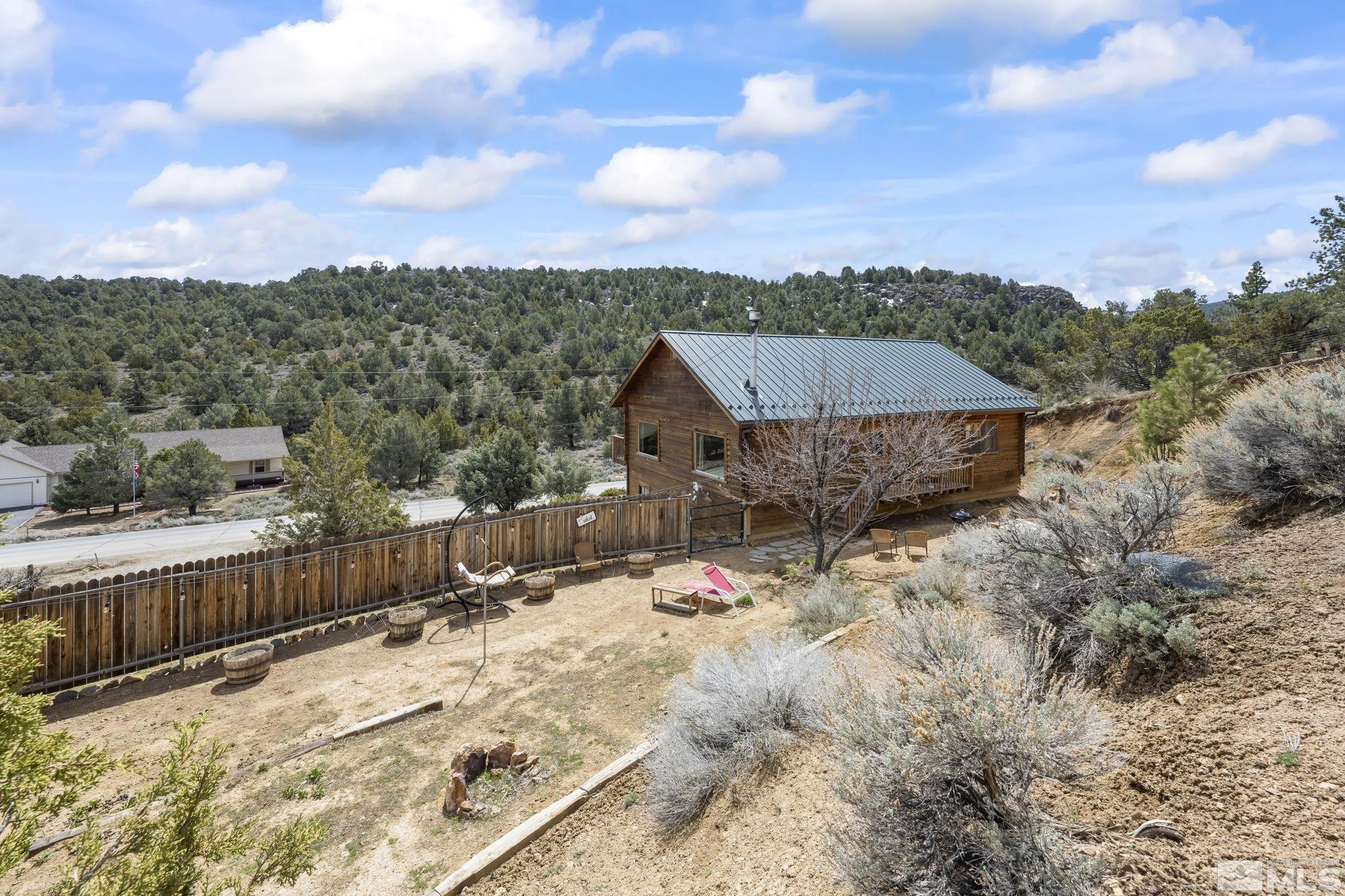2200 Lousetown Road Reno, NV 89521 - Photo 32 of 40 a view of a house with a yard