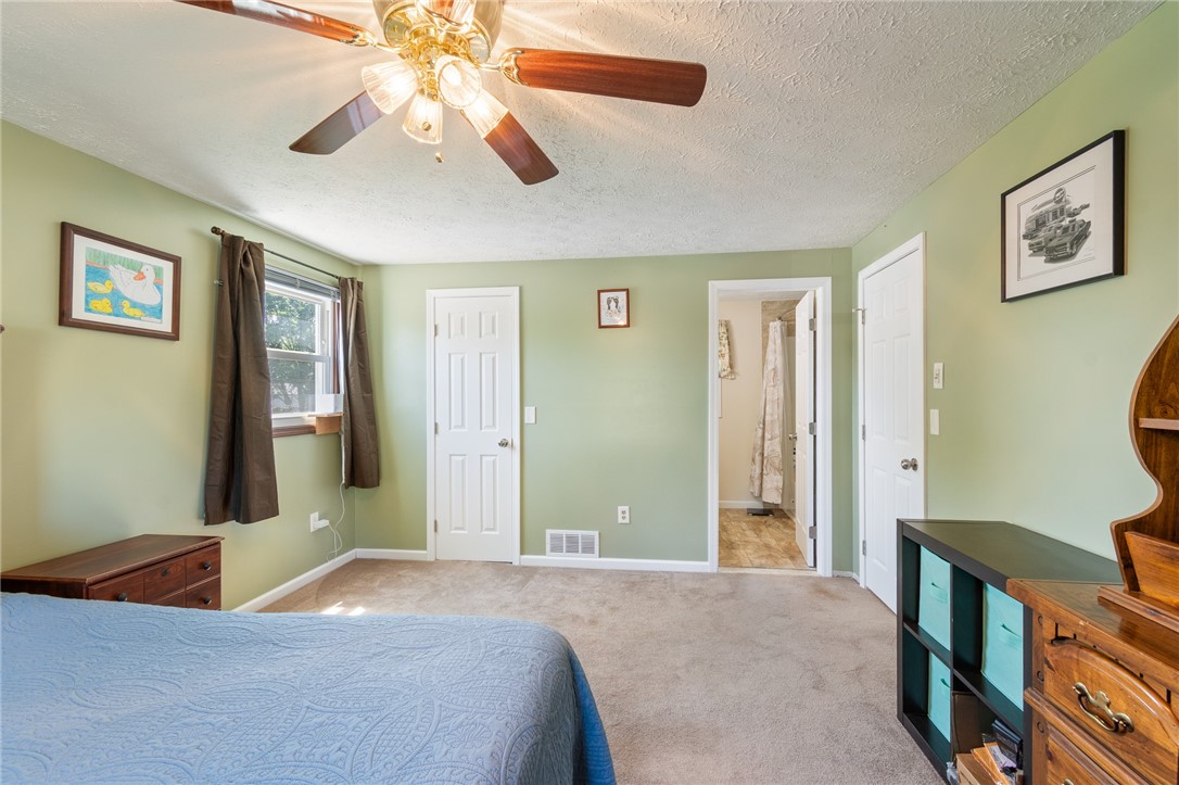 25 Spring Tree Lane Greece, NY 14612 - Photo 21 of 40 The roomy PRIMARY SUITE with its own FULL BATH!