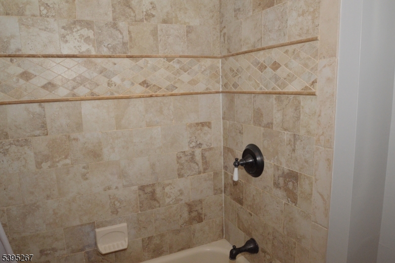 139 Forest Street, Unit 1 Montclair, NJ 07042 - Photo 11 of 23 a bathroom with a shower