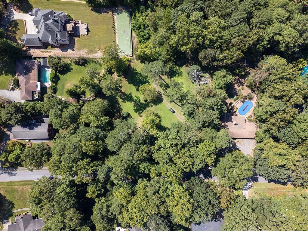 4398 King Valley Drive Southeast Smyrna, GA 30082 - Photo 2 of 17 a view of a house with a yard and garden