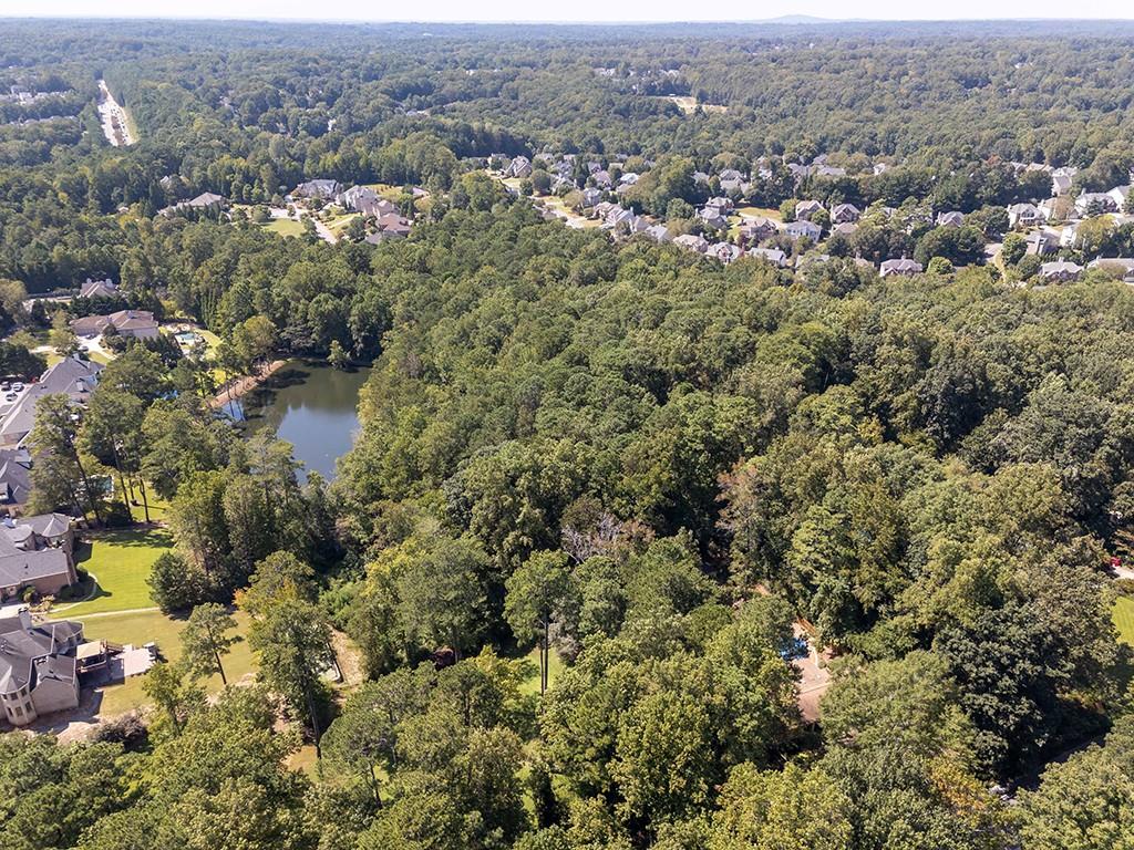 4398 King Valley Drive Southeast Smyrna, GA 30082 - Photo 6 of 17 an aerial view of residential house with outdoor space and trees all around