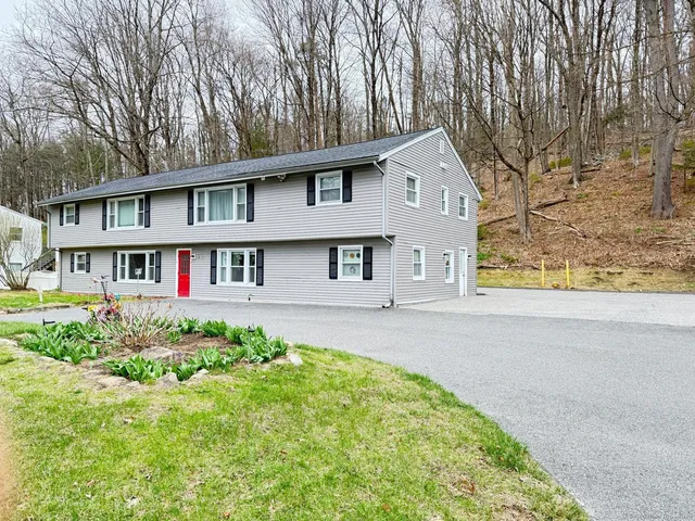 front view of house with a yard