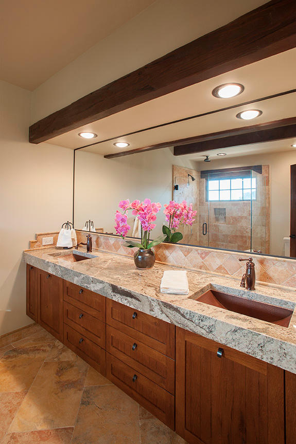 20 Alisal Road Santa Barbara, CA 93103 - Photo 24 of 32 a bathroom with a granite countertop sink and a mirror