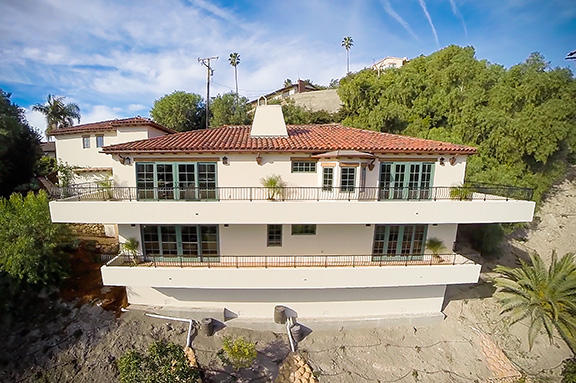 20 Alisal Road Santa Barbara, CA 93103 - Photo 5 of 32 a front view of a house with a swimming pool