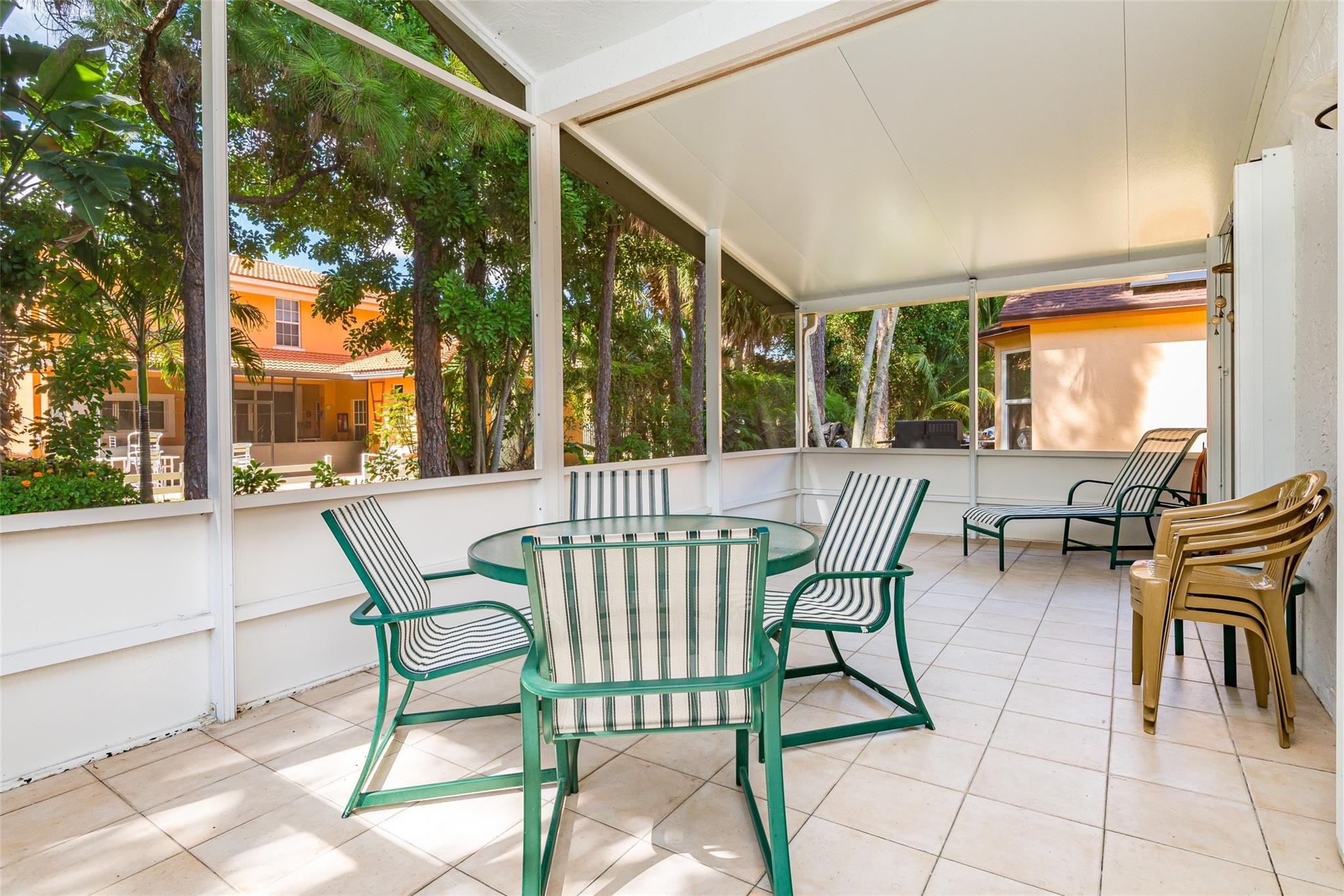 140 Paddock Lane Greenacres, FL 33413 - Photo 15 of 27 Screened Patio