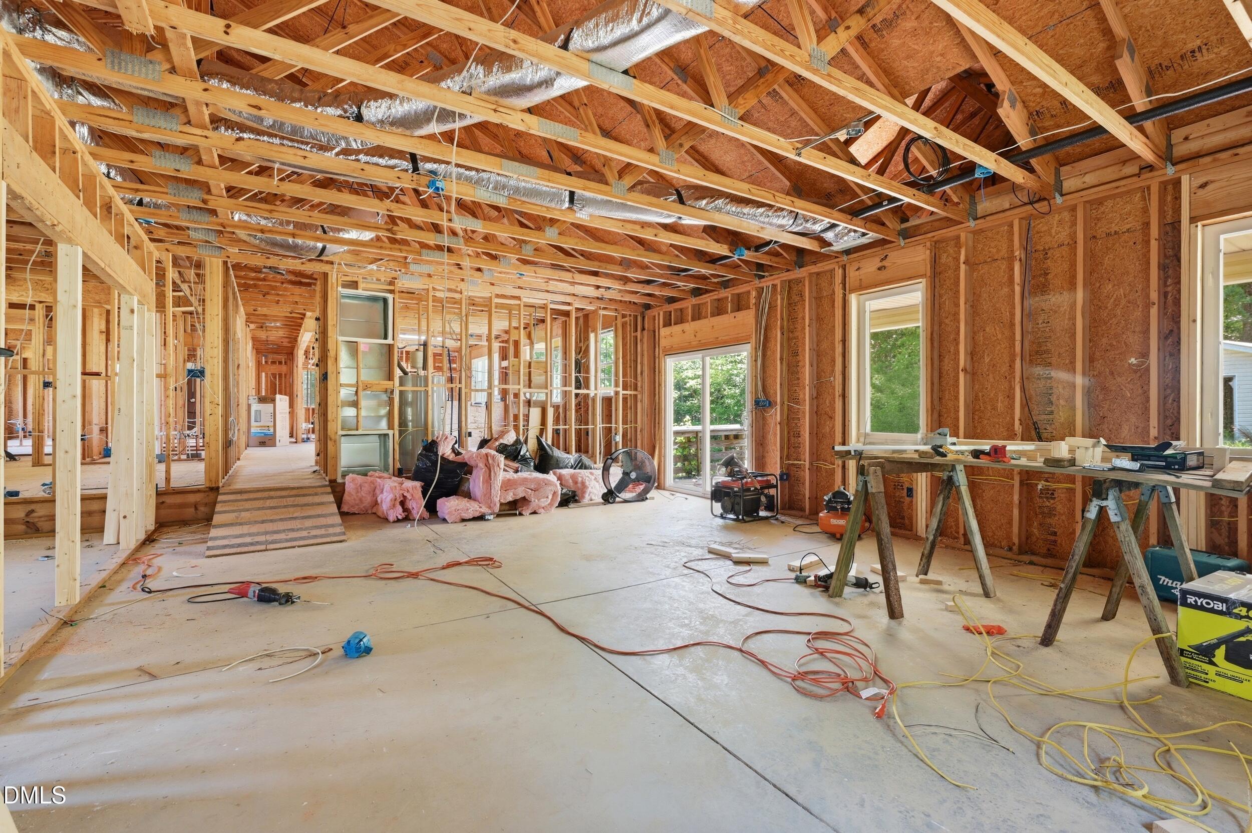 129 Shaman Drive Spring Hope, NC 27882 - Photo 17 of 43 a view of a lobby with furniture and floor to ceiling windows
