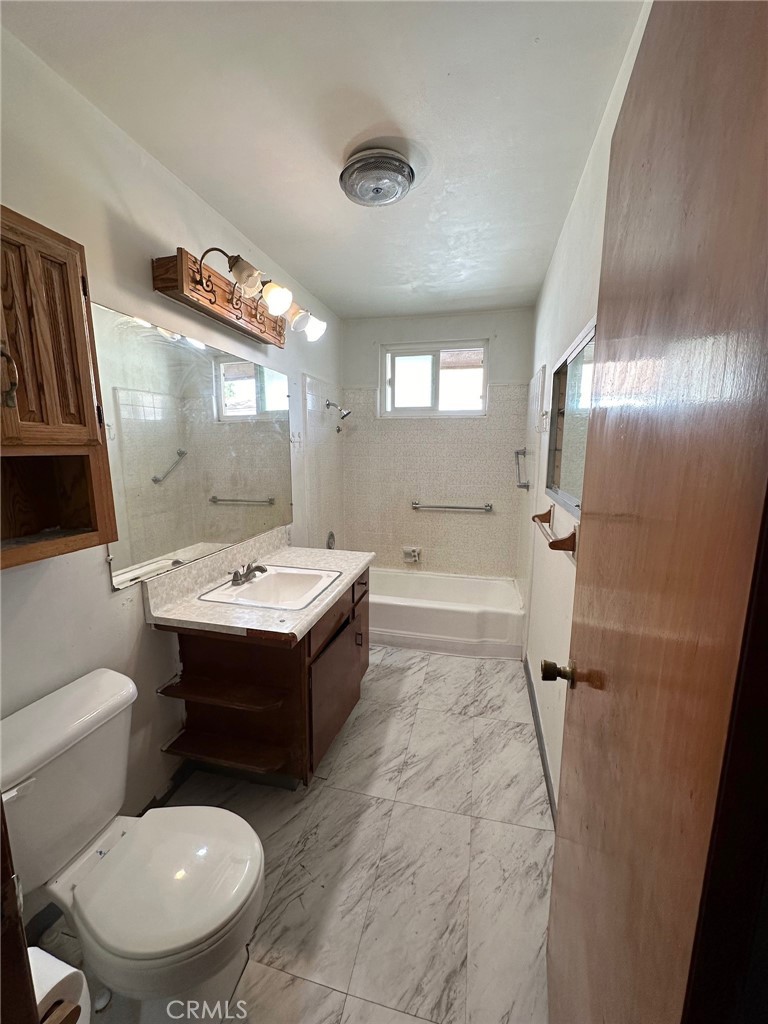 25 Fano Street Arcadia, CA 91006 - Photo 10 of 13 a bathroom with a sink toilet and shower