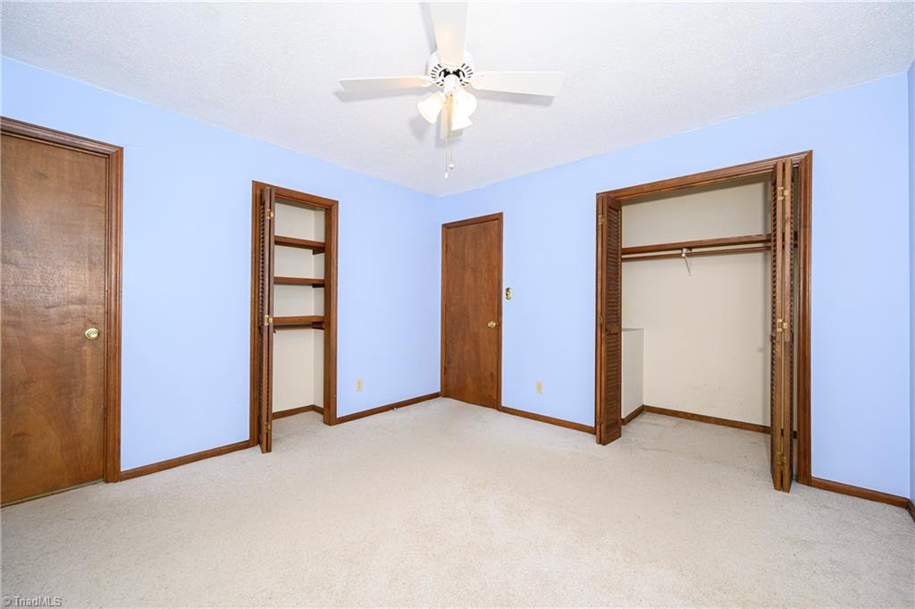 4340 Stone Ridge Drive Trinity, NC 27370 - Photo 17 of 29 Master bedroom showing closet and linen master linen closet