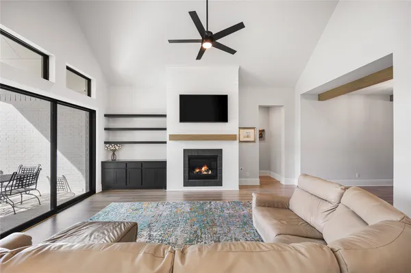 a living room with furniture and a window