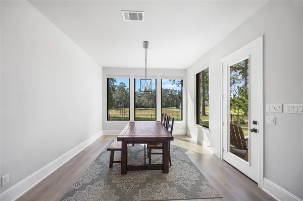 a bathroom with a bathtub and a sink