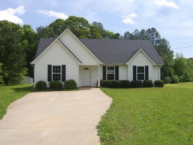 143 Church Road Thomaston, GA 30286 - Photo 1 of 1 a front view of a house with yard
