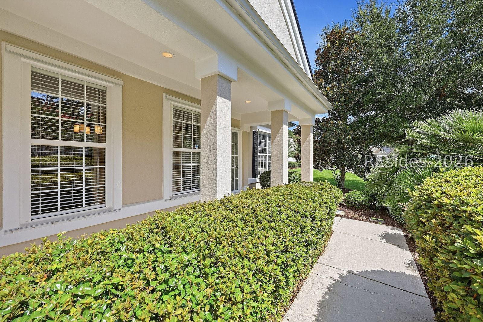 108 Landing Lane Bluffton, SC 29909 - Photo 11 of 63 Hedge lined front porch