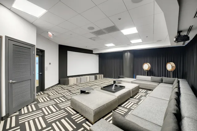 a living room with furniture and window