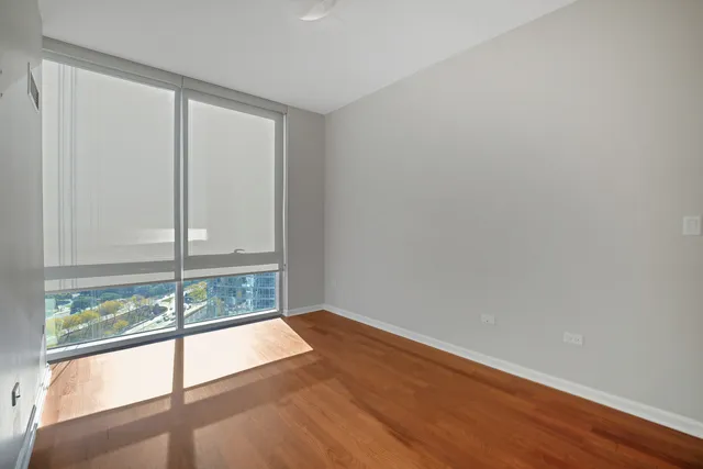 a view of an empty room and window