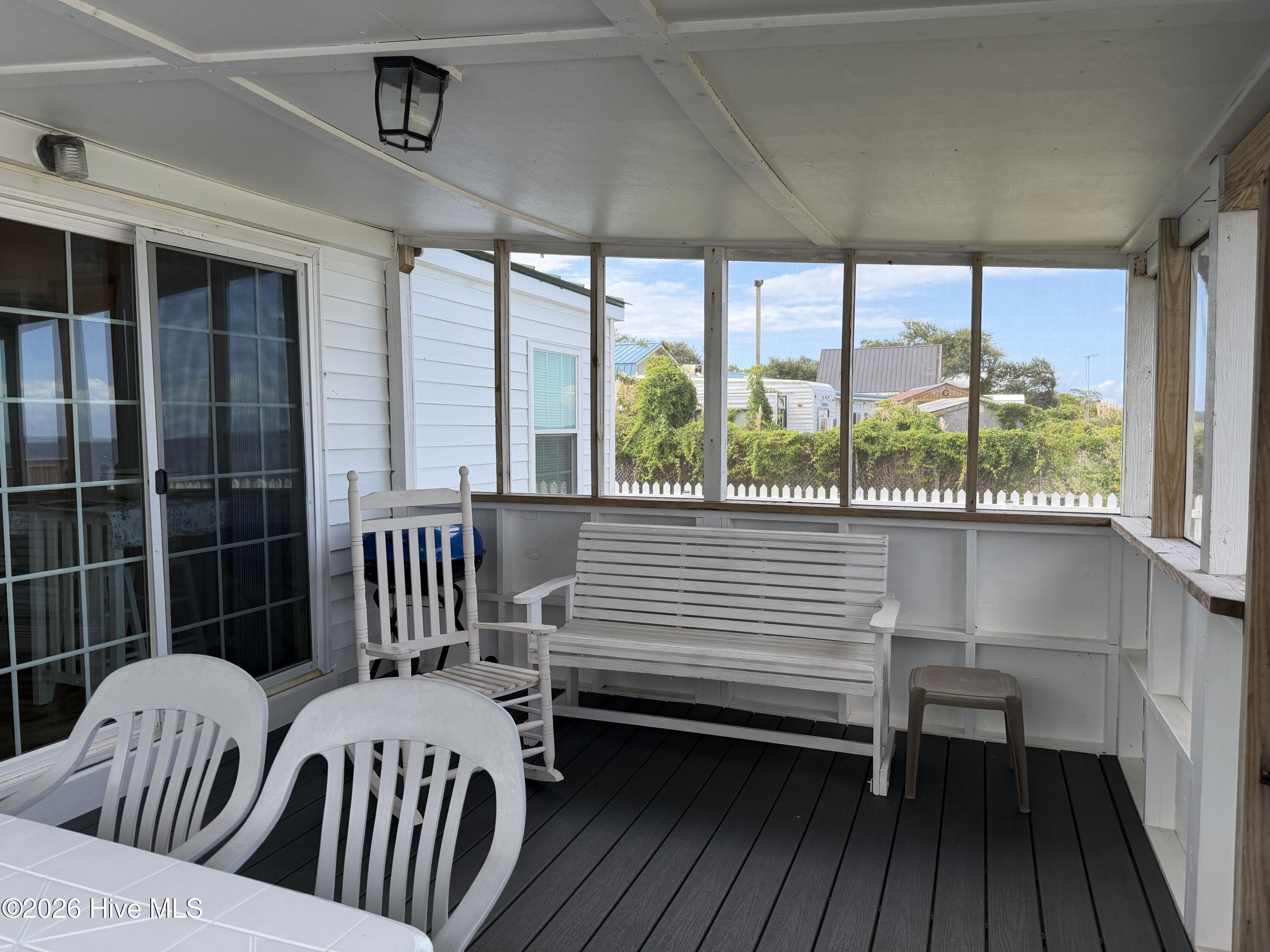 391 Lola Road Cedar Island, NC 28520 - Photo 18 of 34 Screened Rear Porch